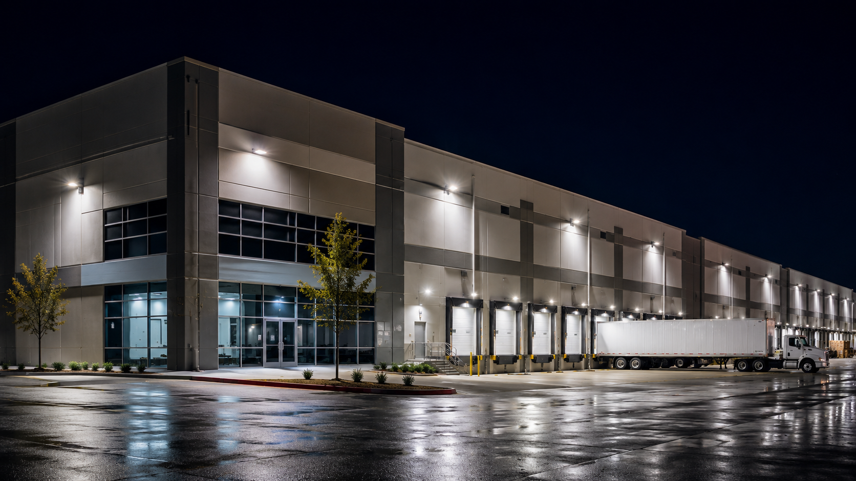 Commercial building exterior showcasing LED lighting solutions for warehouse, industrial, and commercial applications