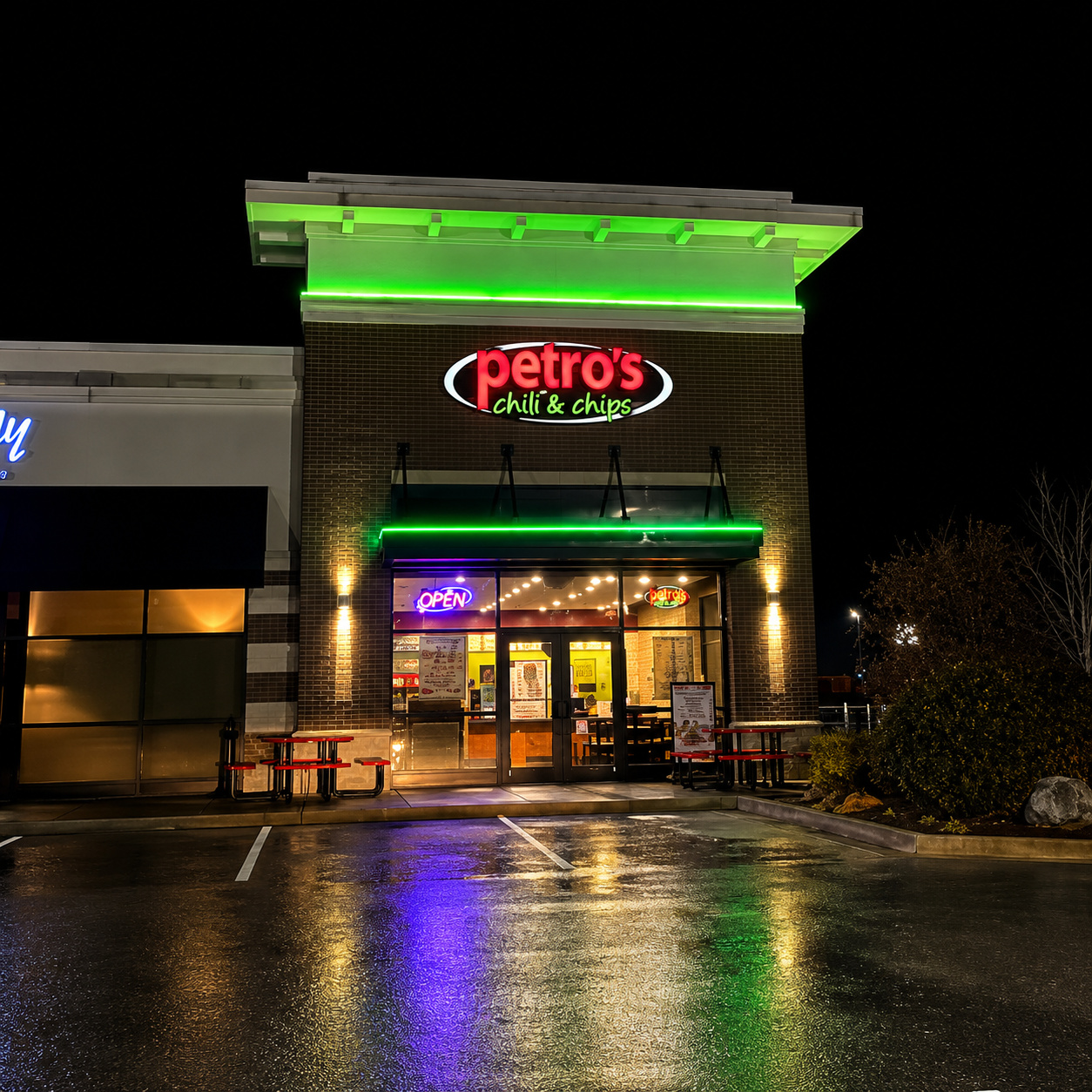 Restaurant exterior illuminated with commercial lighting systems