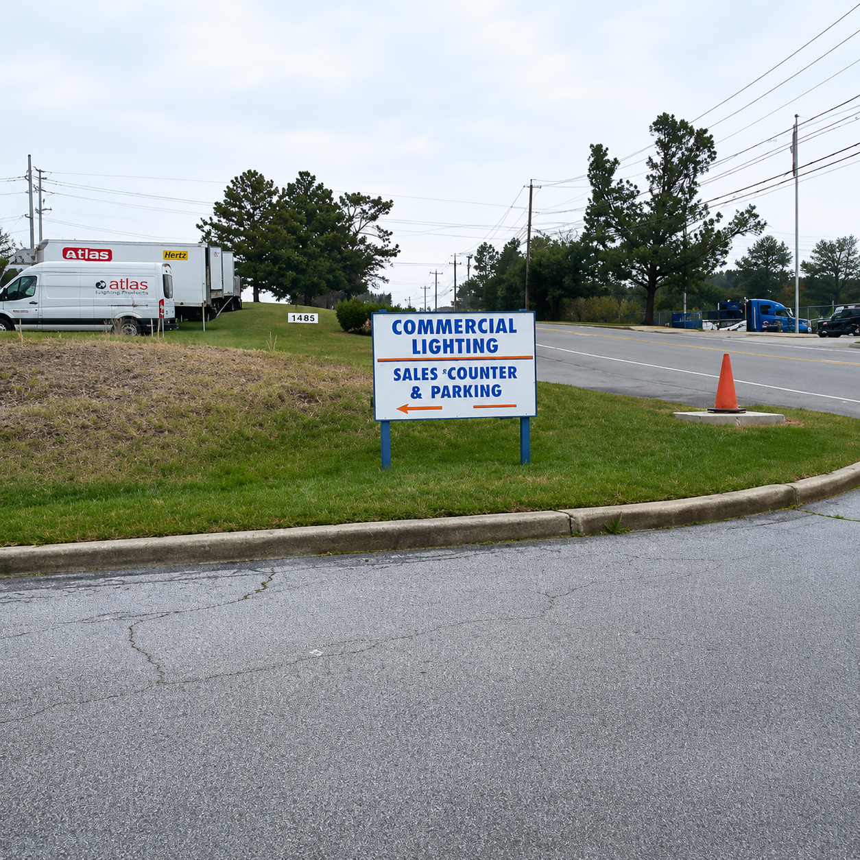 Commercial Lighting Supply sales counter and parking entrance sign
