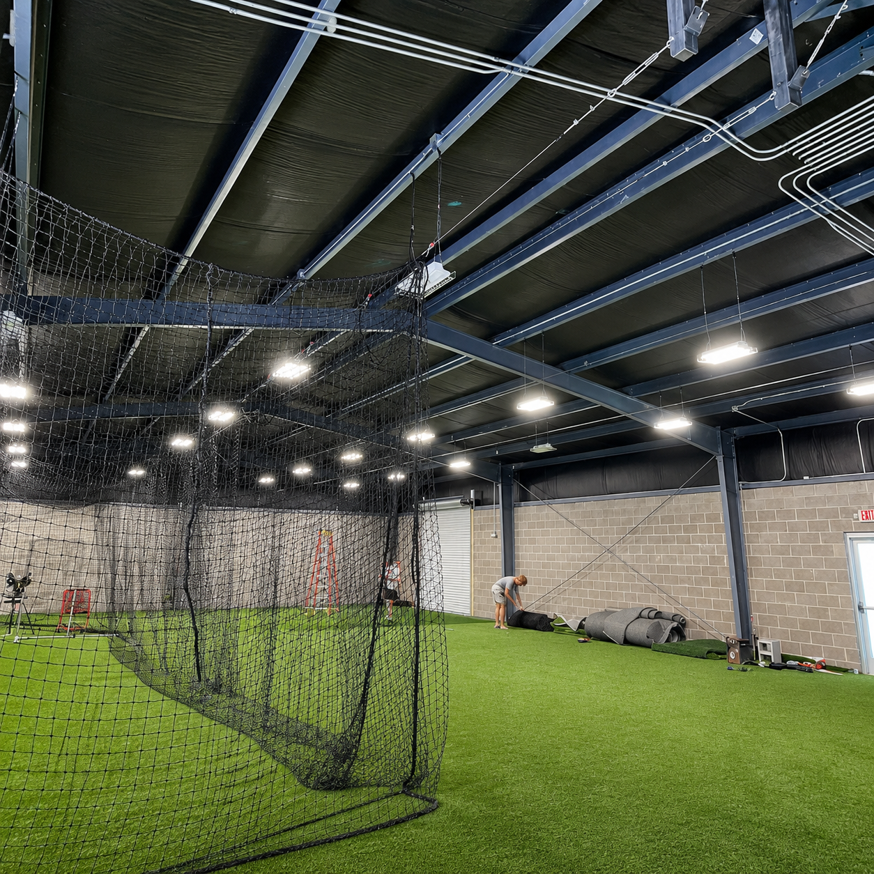 Indoor sports facility illuminated with commercial LED high bay lighting