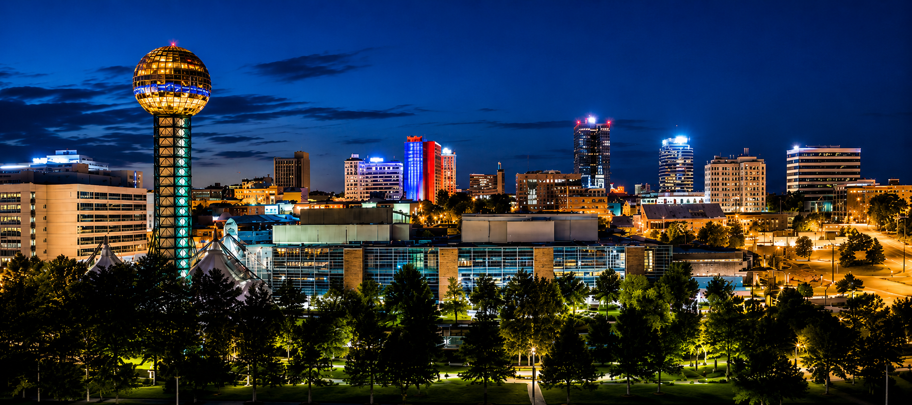 Knoxville, Tennessee skyline at night featuring the Sunsphere and downtown city lights representing Commercial Lighting Supply, established in 1996, serving contractors, businesses, and facilities nationwide.